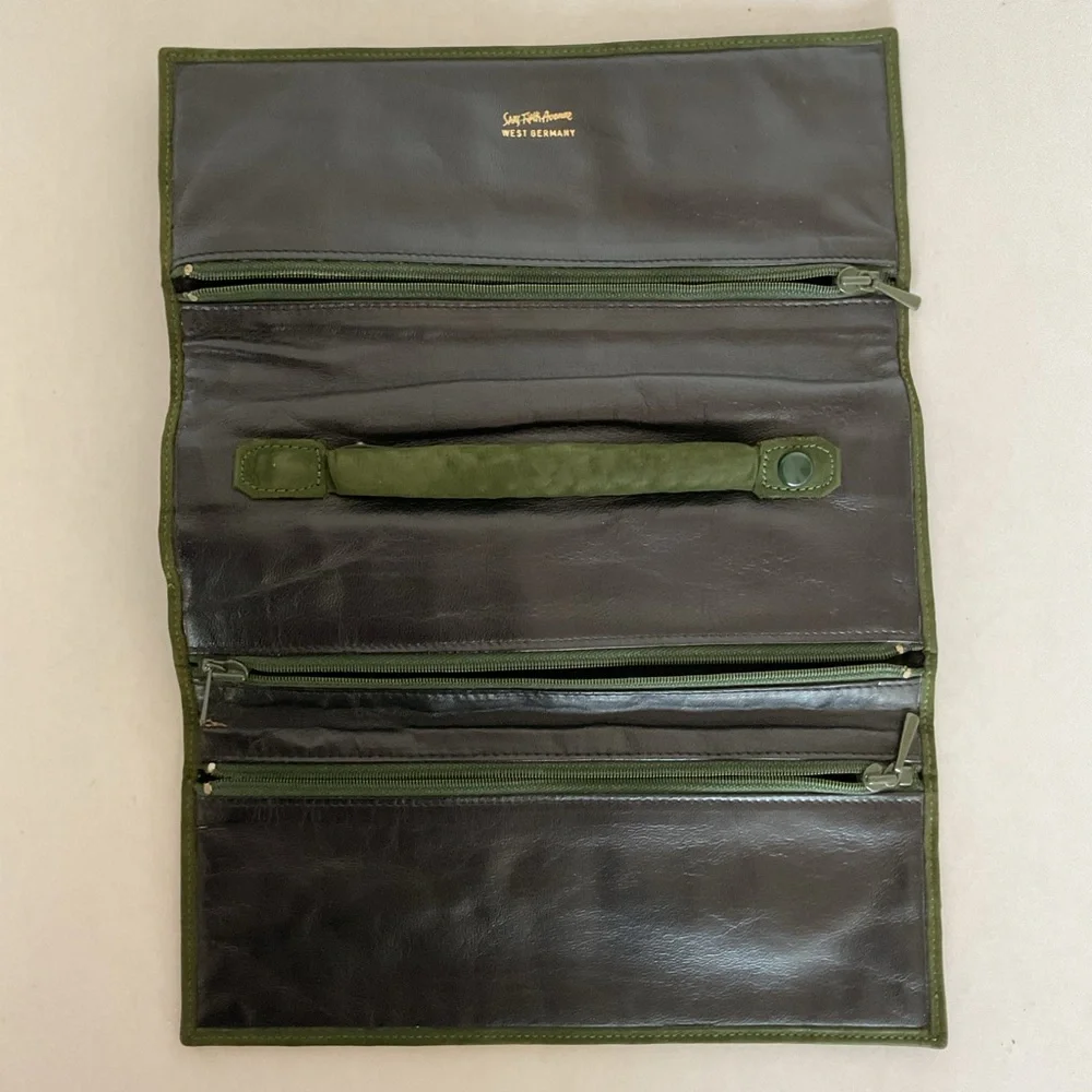 Saks Fifth Avenue vintage green suede leather jewelry roll.